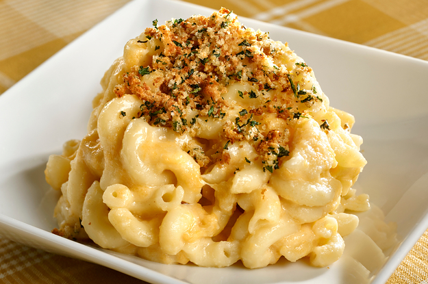 On the left, some mac and cheese topped with some herbs and bread crumbs