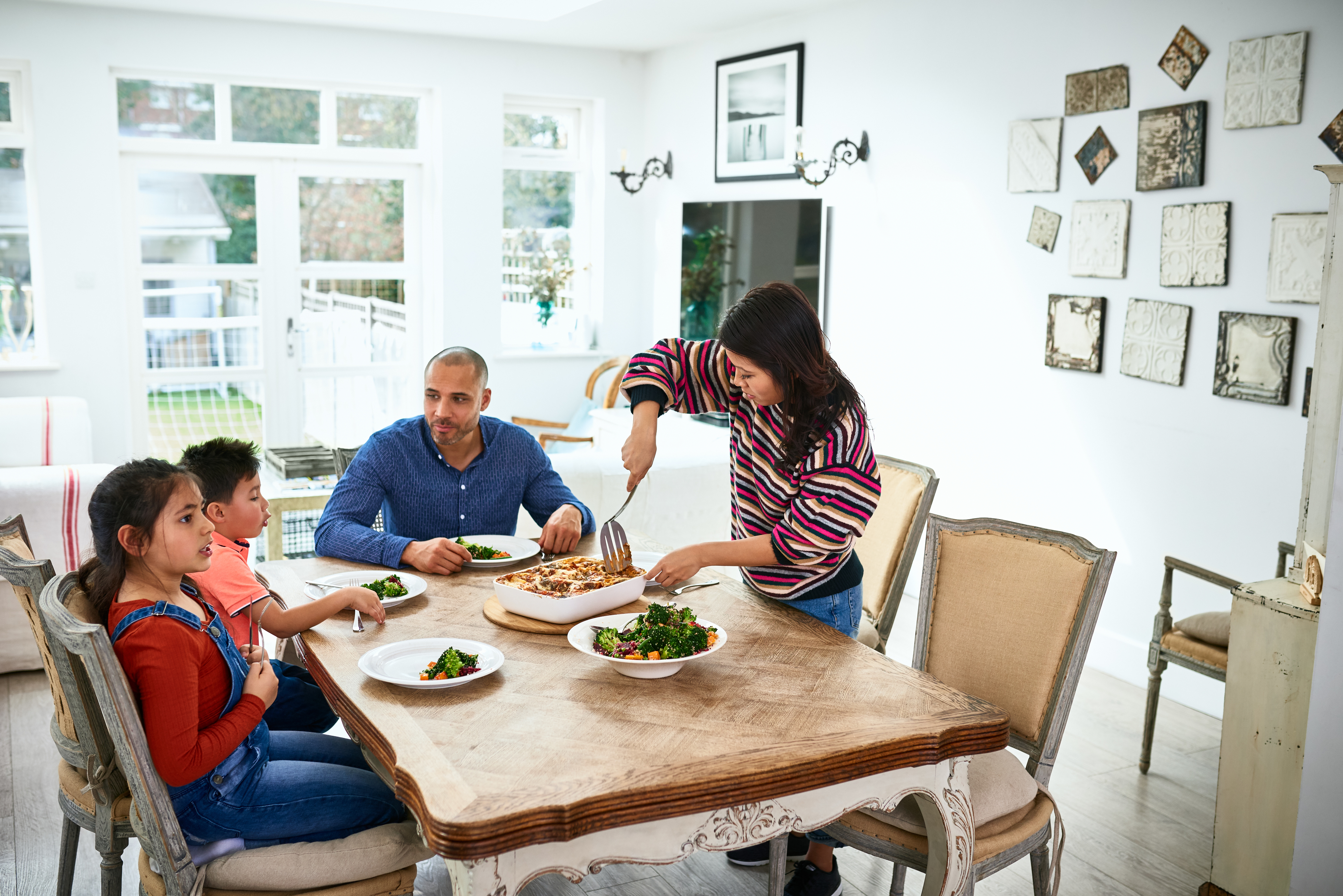 A family eating dinner together at home