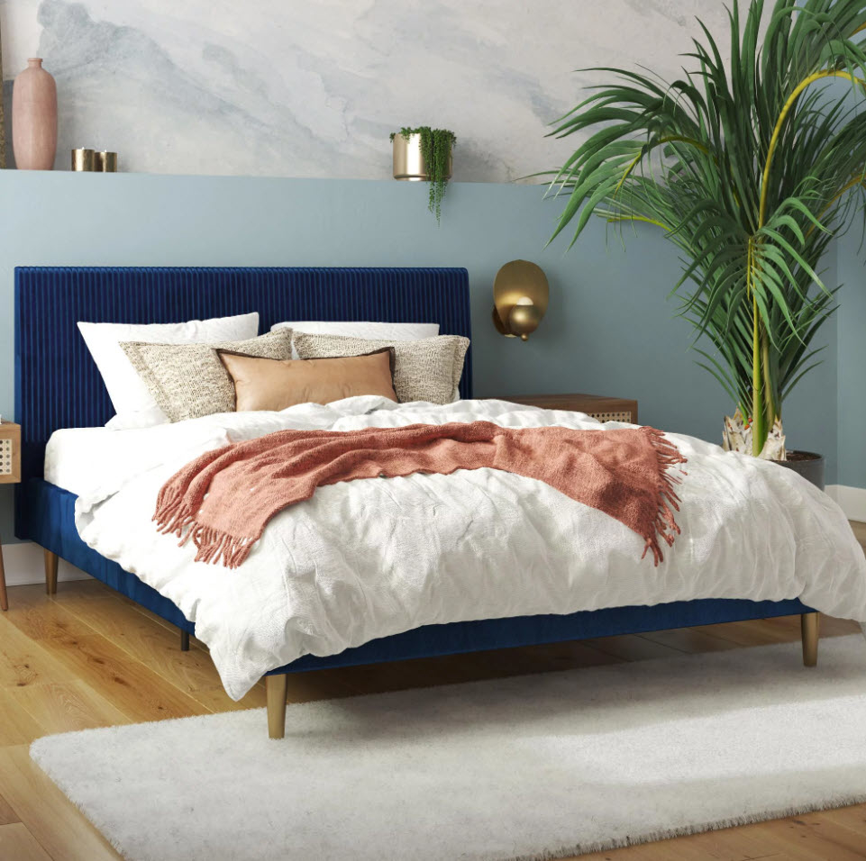 blue velvet bedframe with bedding, etc.