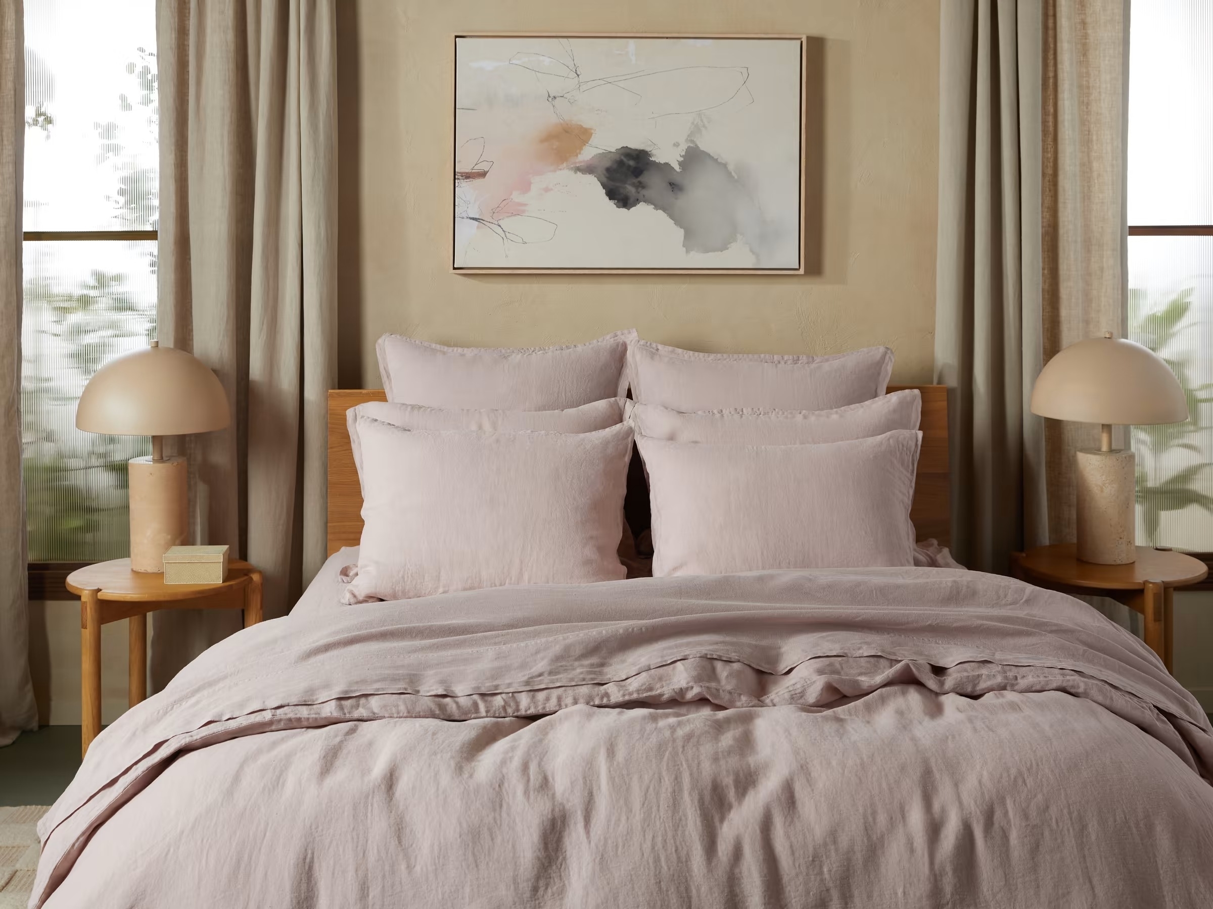 pink linen sheet set with a fitted sheet, pillowcase, and duvet cover