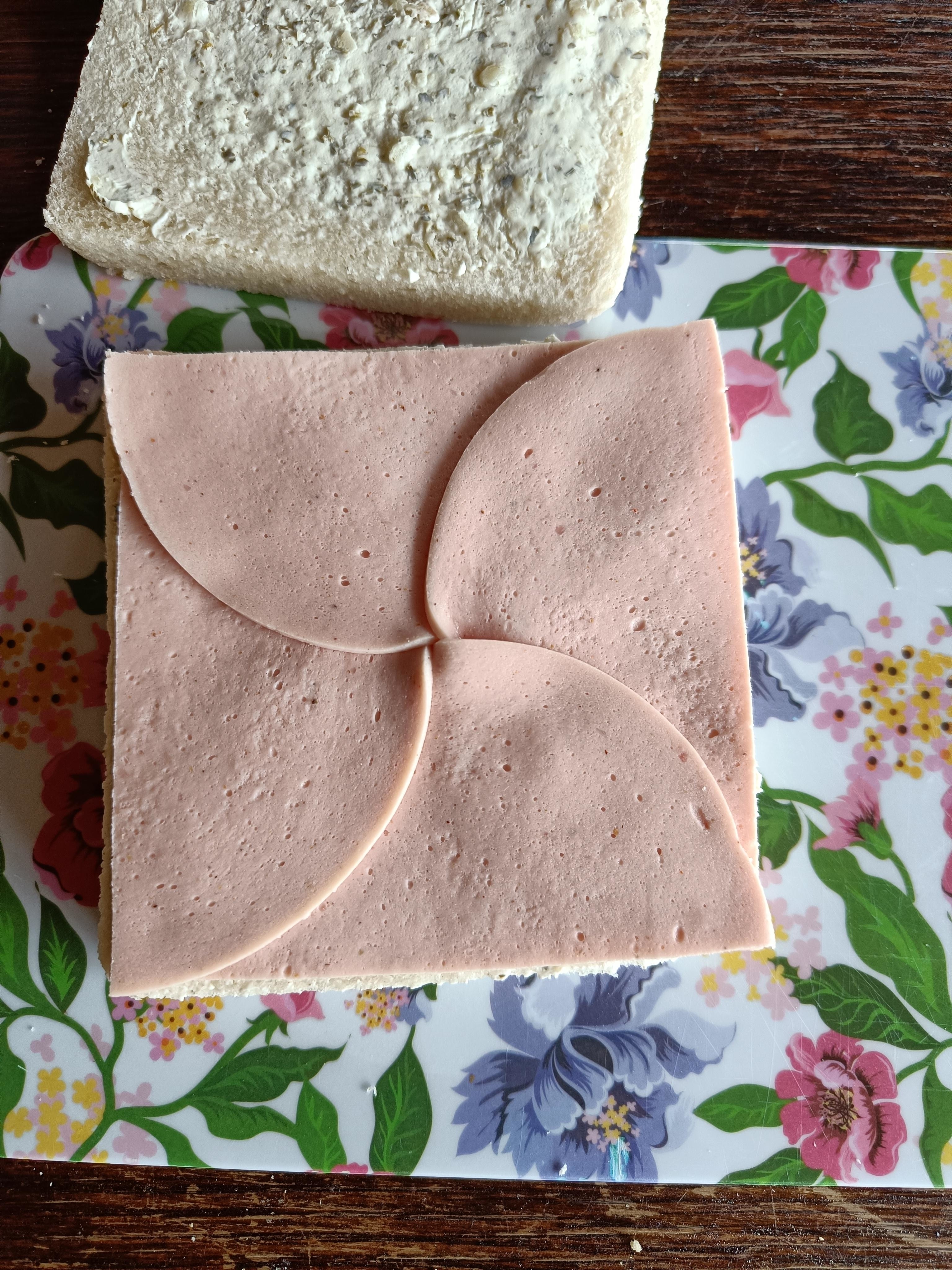 Lunch meat on a piece of bread