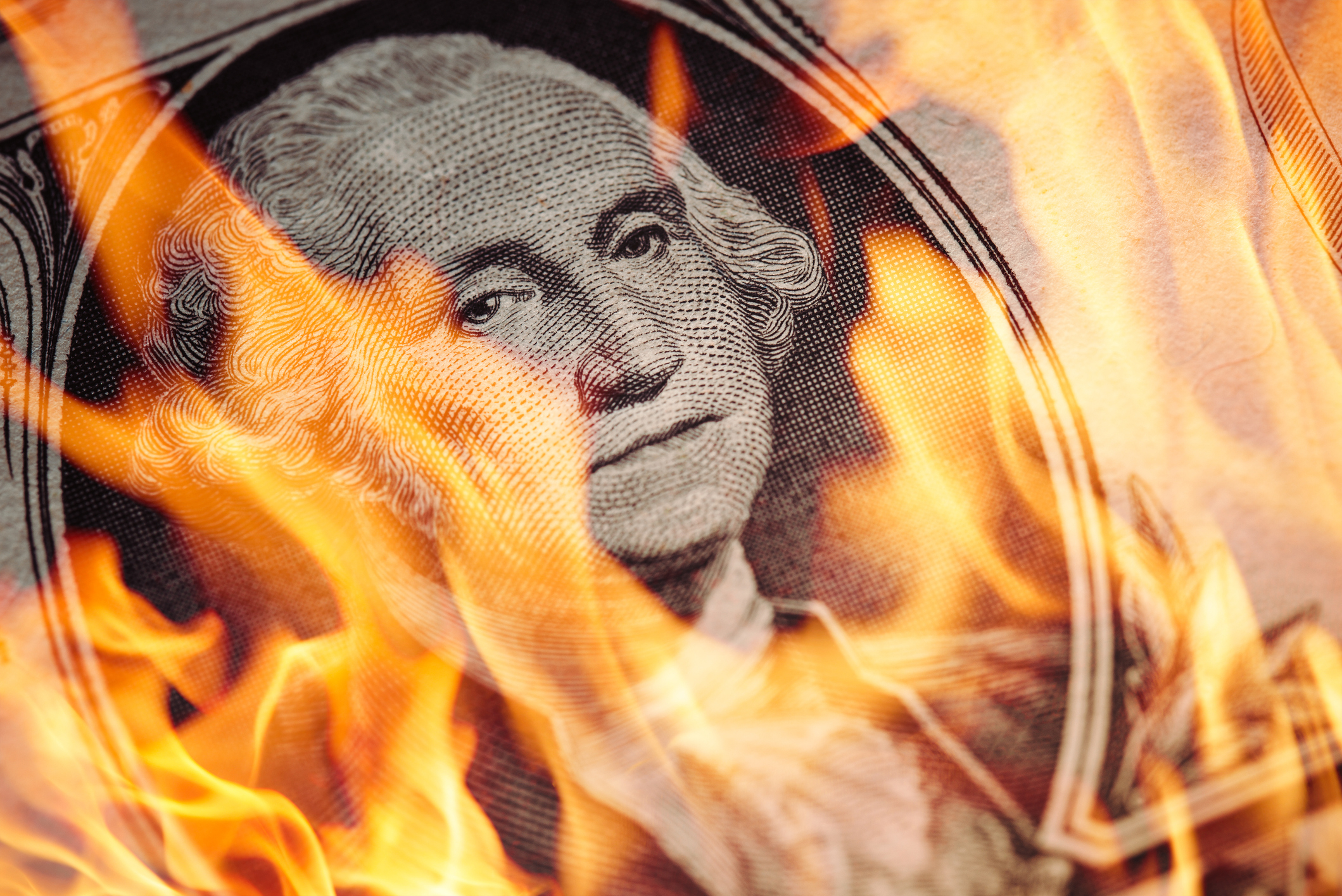 A dollar bill on fire