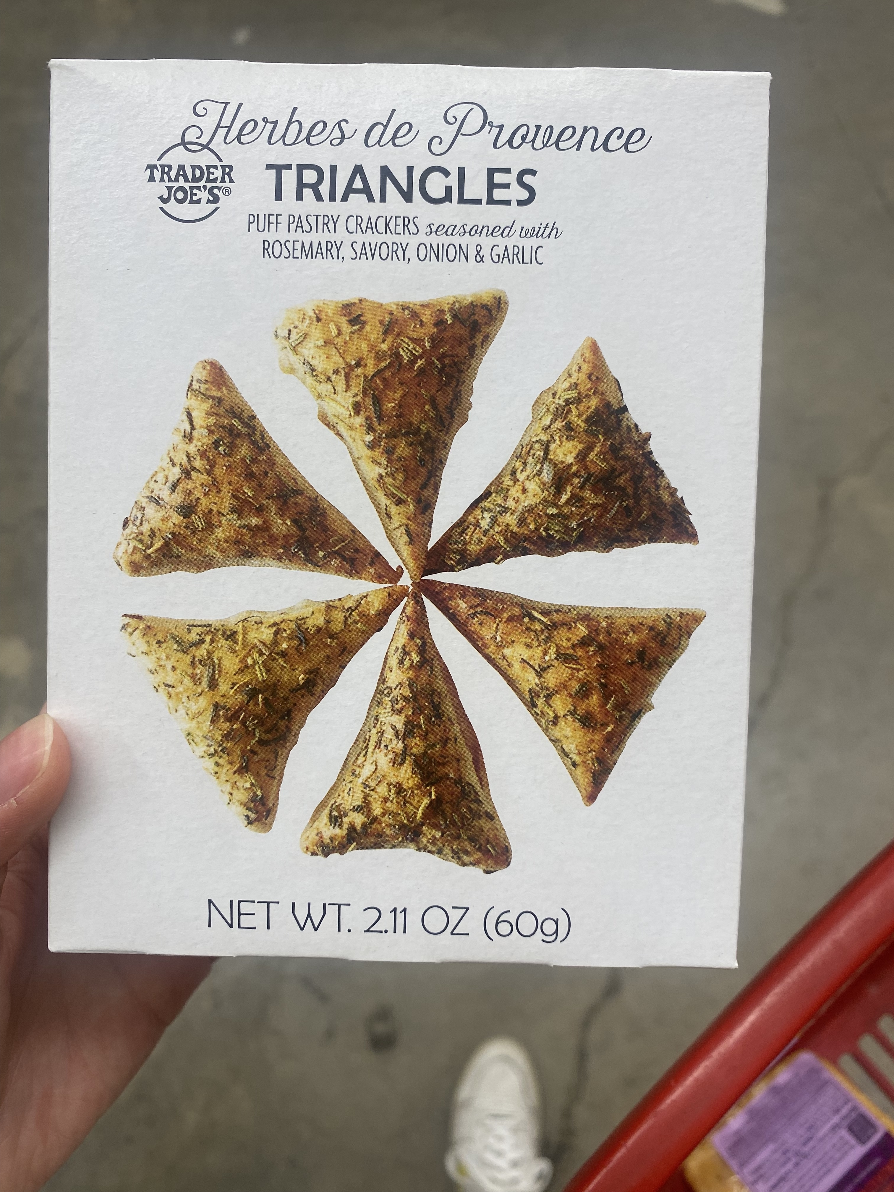 a box of Herbes de Provence triangles