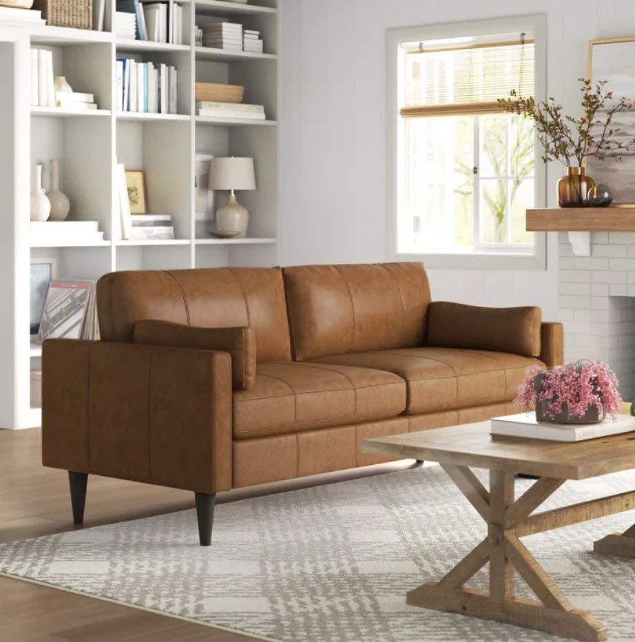 brown leather large loveseat in living room