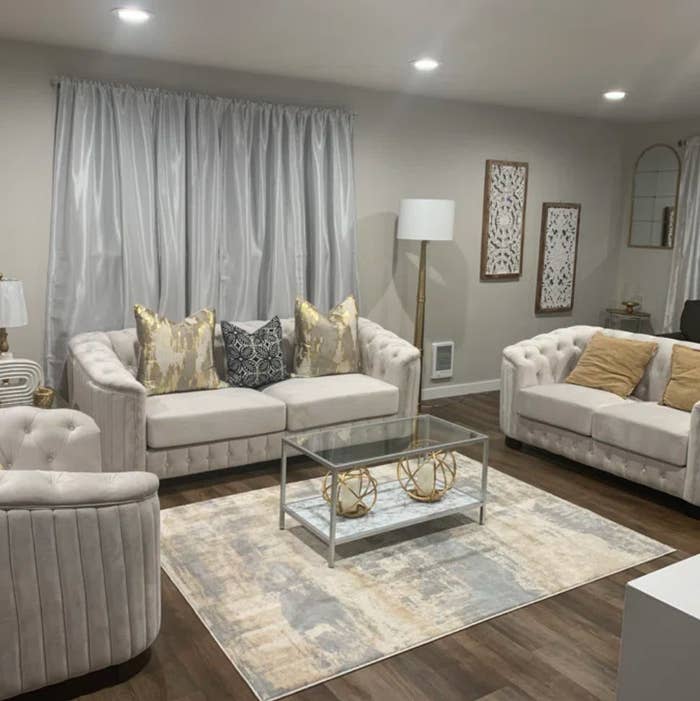 white tufted three-piece living room set