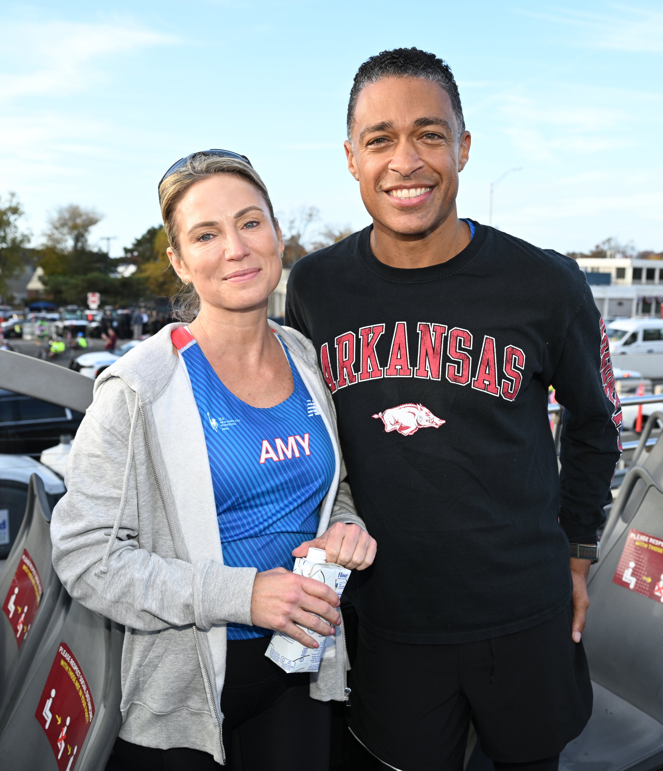 amy and tj in casual clothes outside