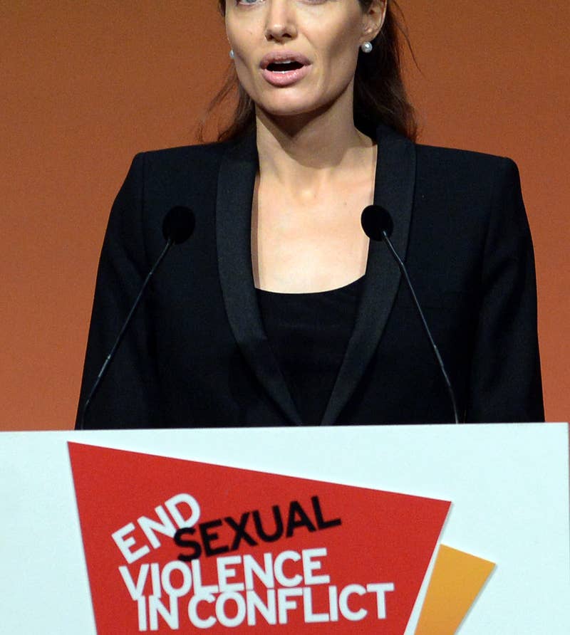 Angelina speaking behind a podium