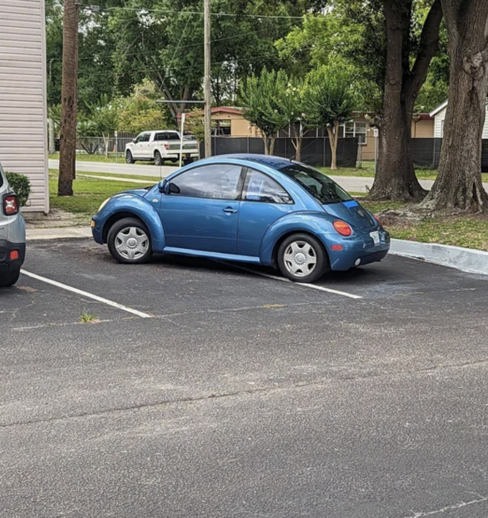 small car taking up two spots