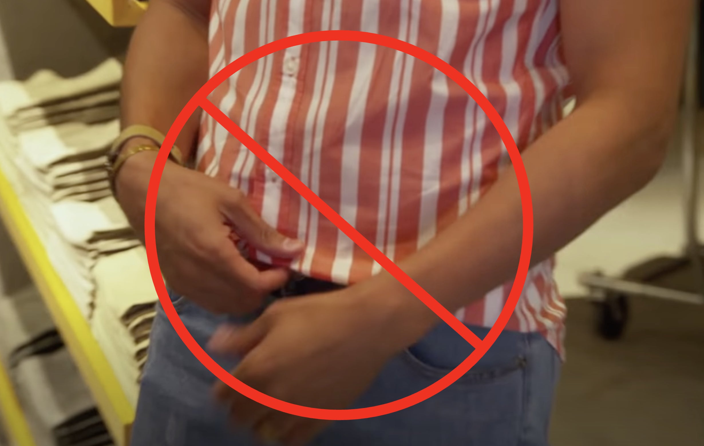 A big crossed out circle on top of Tan France french tucking
