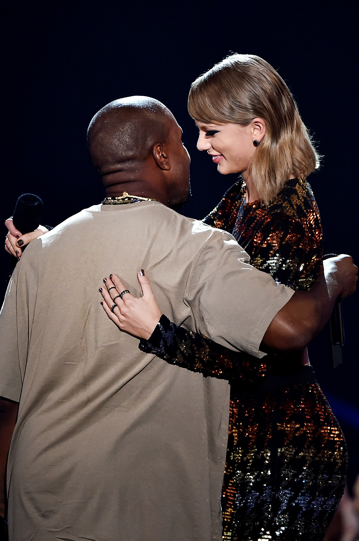 Ye and Taylor embracing