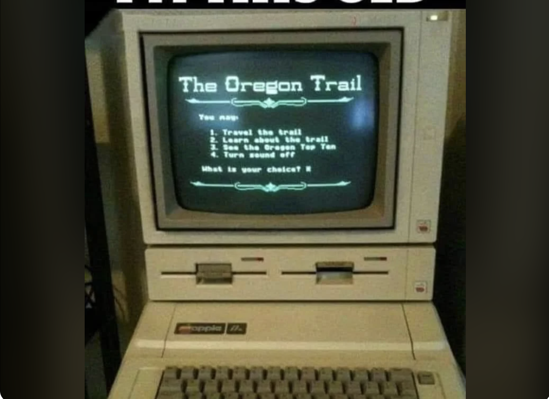 A computer running &quot;The Oregon Trail&quot; game