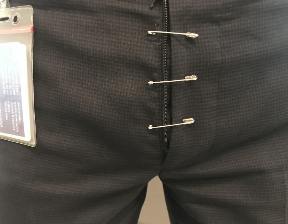 Guy safety pinned his pants together after the zipper broke