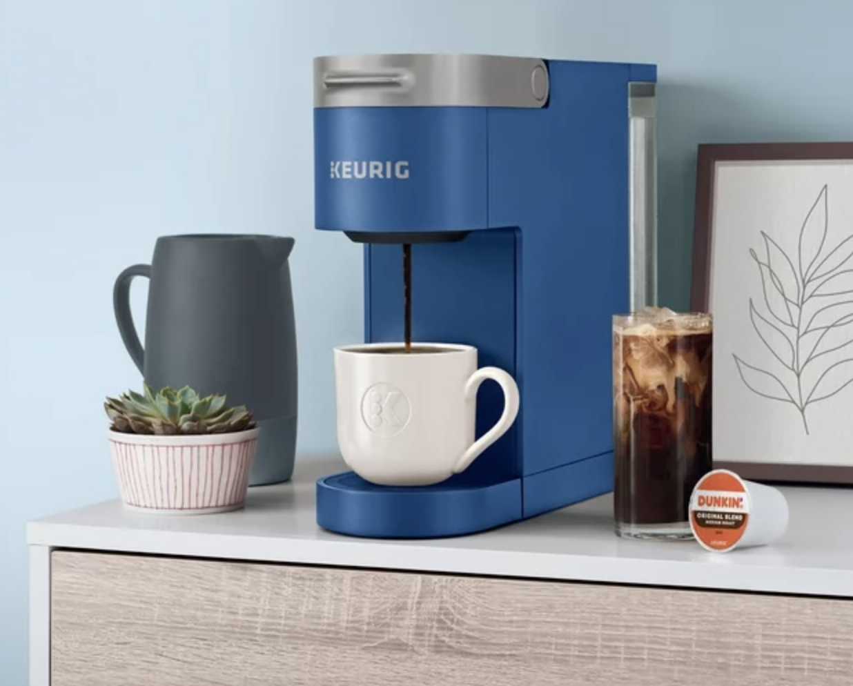 blue Keurig that makes hot and iced coffee