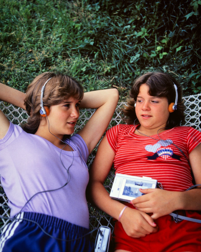 Kids listening to tapes on their headphones