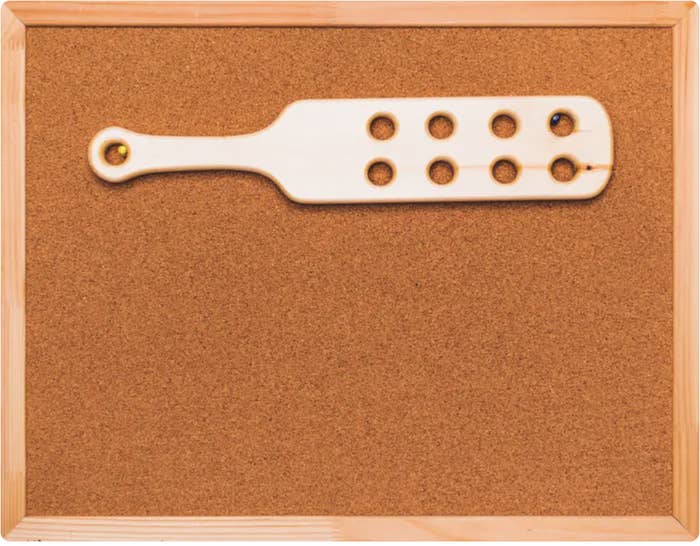 a paddle with holes in it