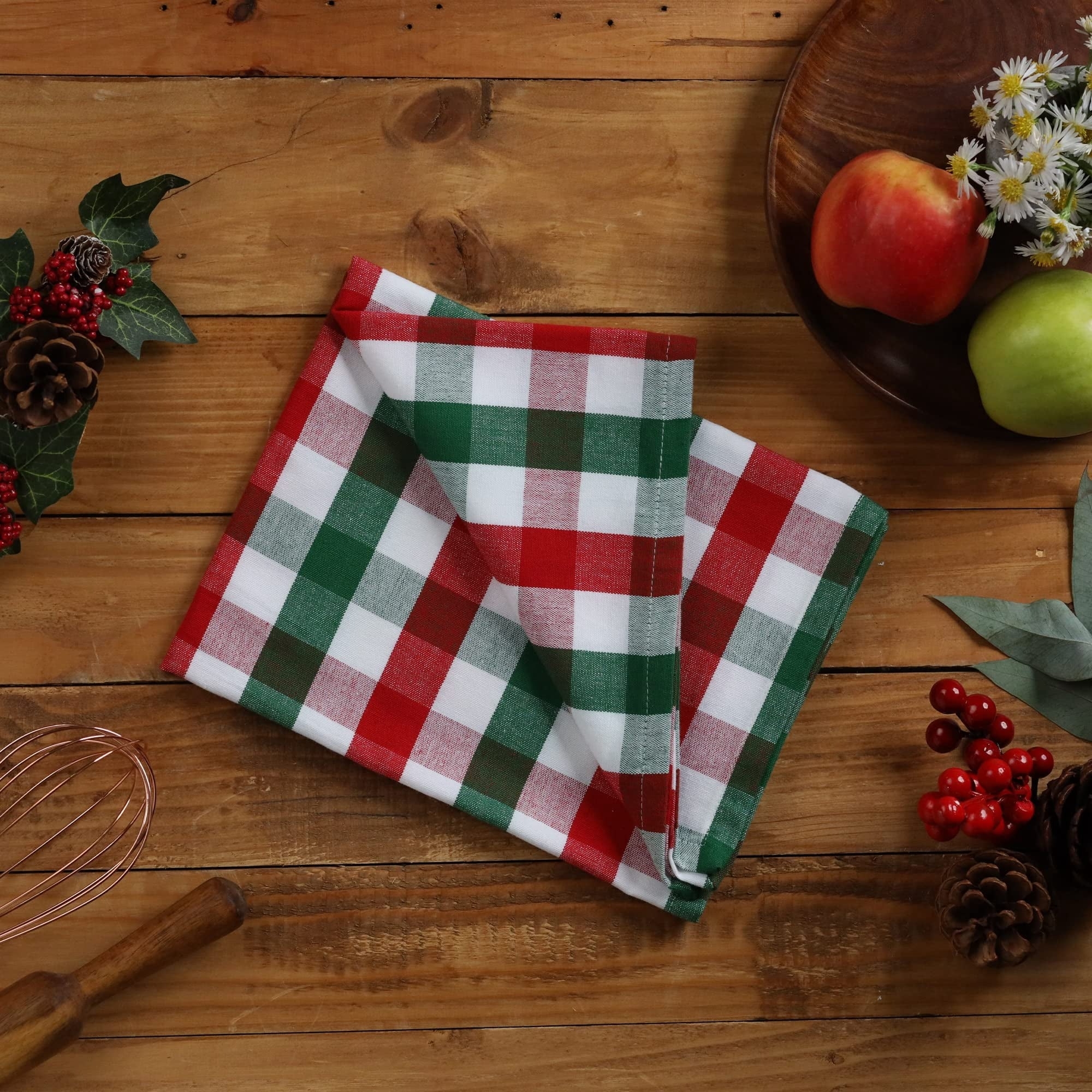 red and green plaid kitchen towel on table