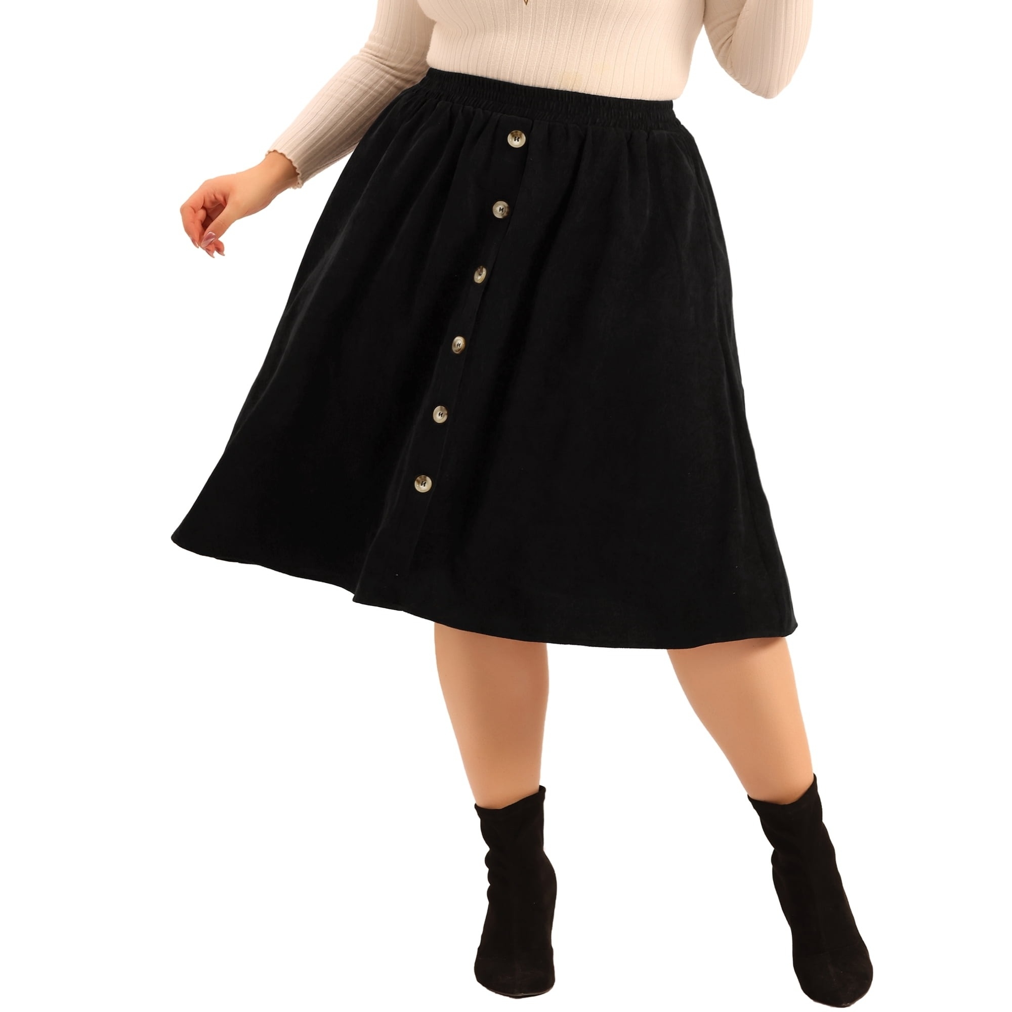 model wearing the black corduroy skirt