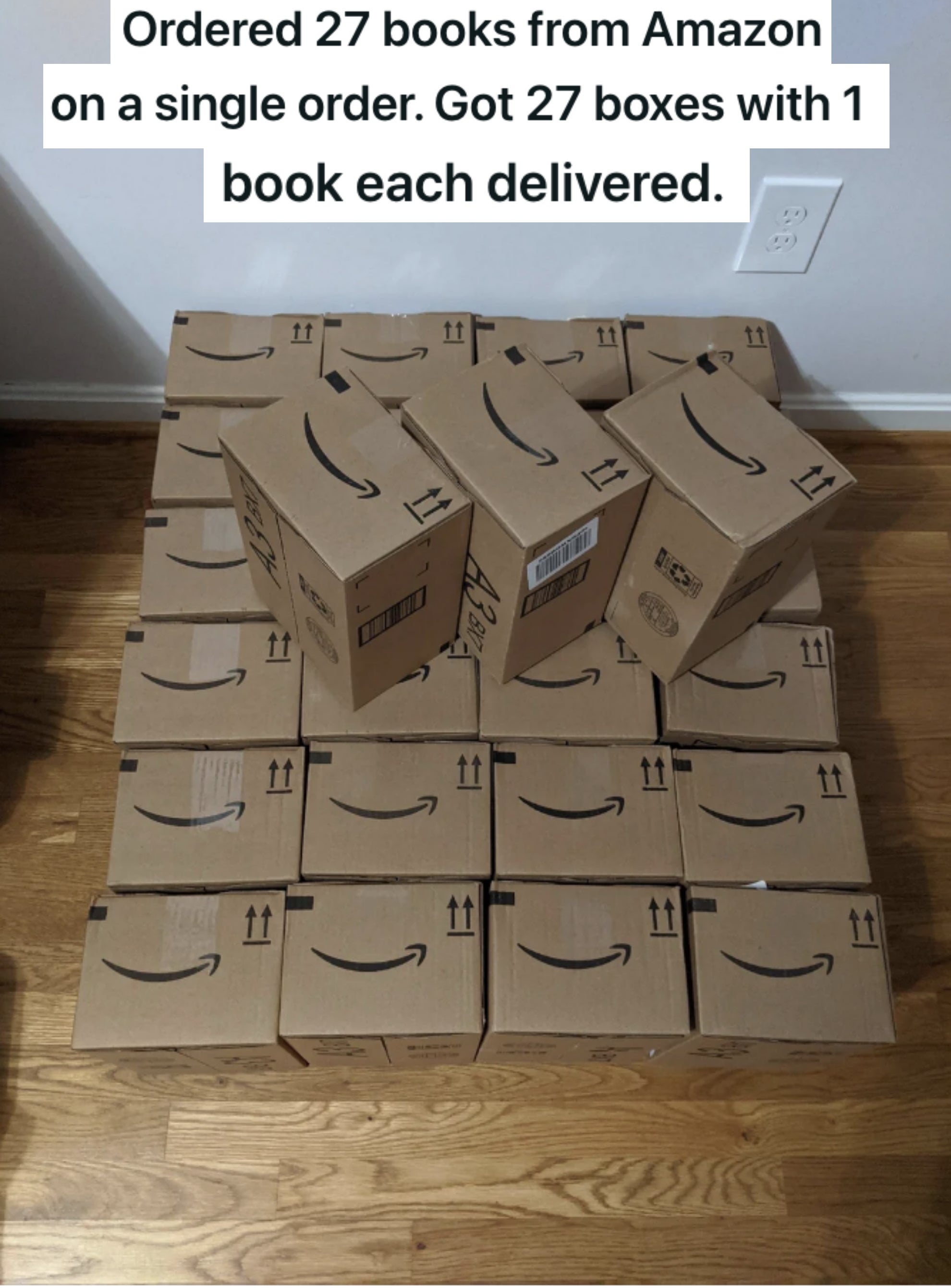a bunch of Amazon packages on the floor