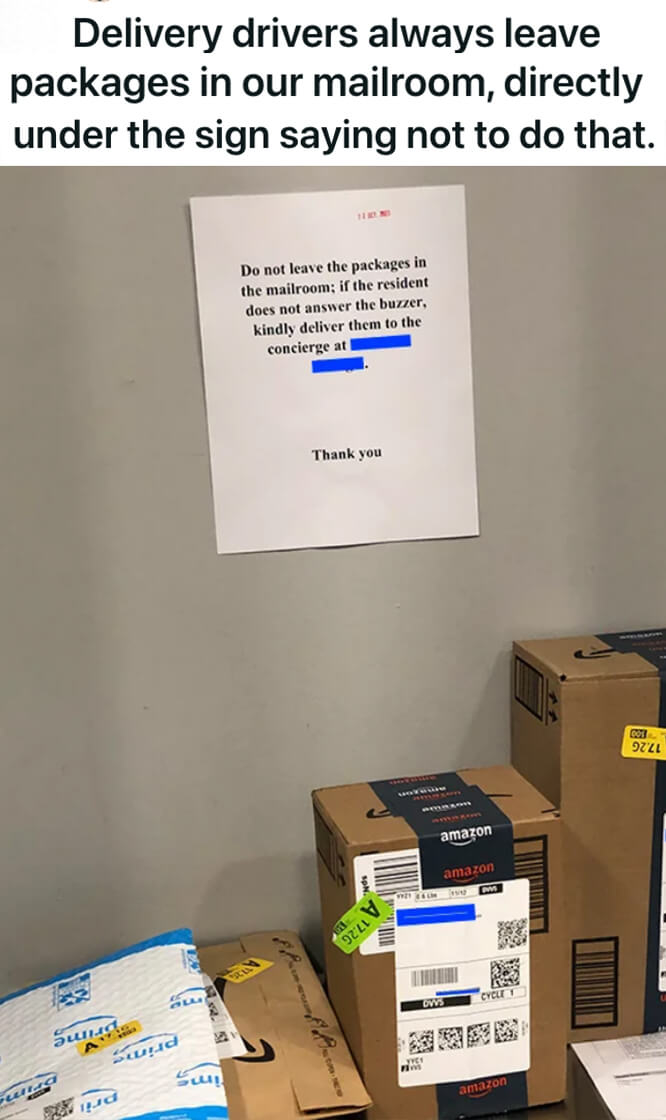 Packages on the ground under a notice telling them to take them to the concierge