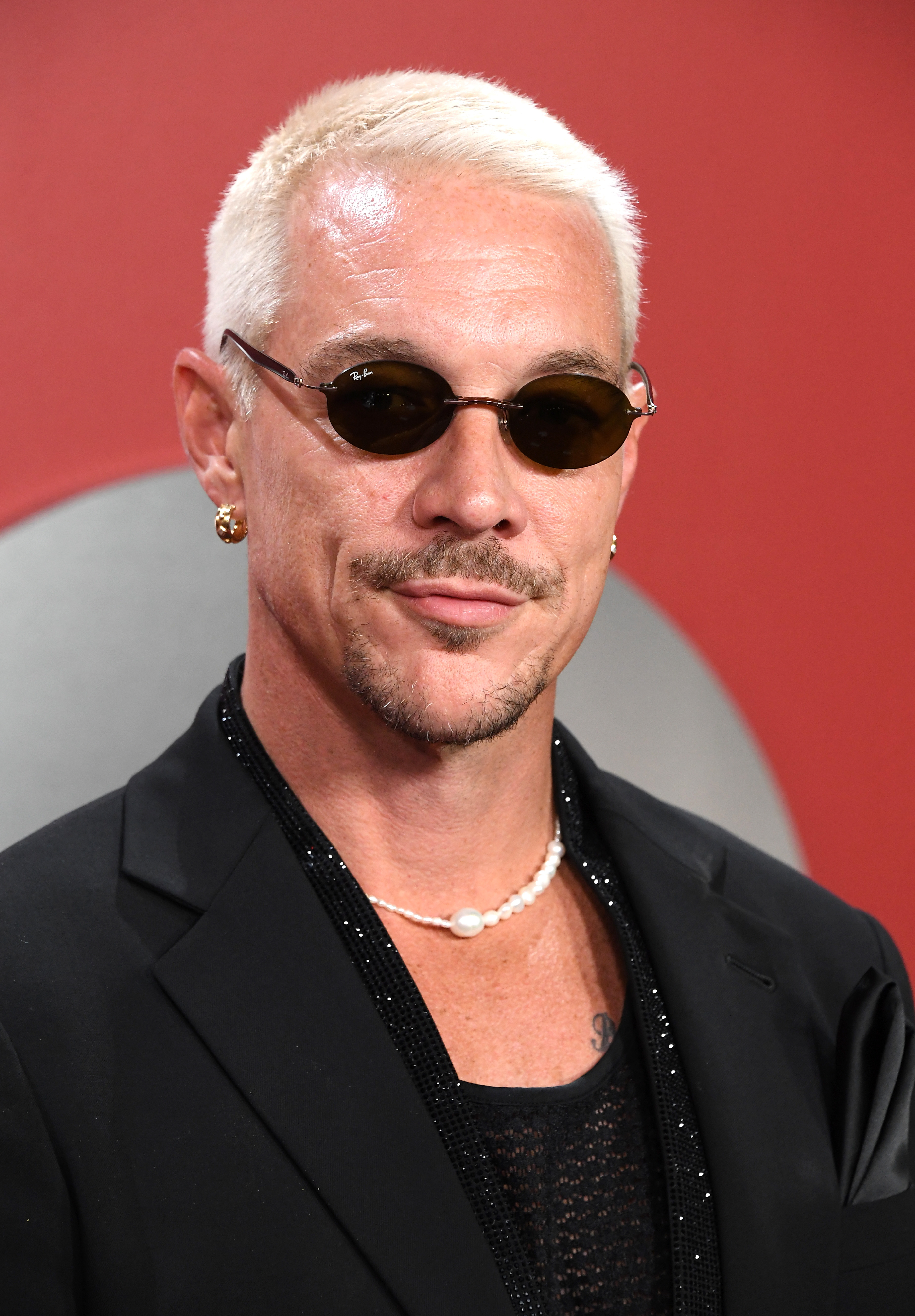 Close-up of Diplo wearing sunglasses