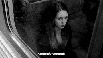 Zoe from American Horror Story: Coven riding a bus, looking out the window, saying &quot;apparently I&#x27;m a witch&quot;