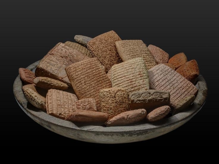 ancient Assyrian tablets that look like shredded wheat cereal