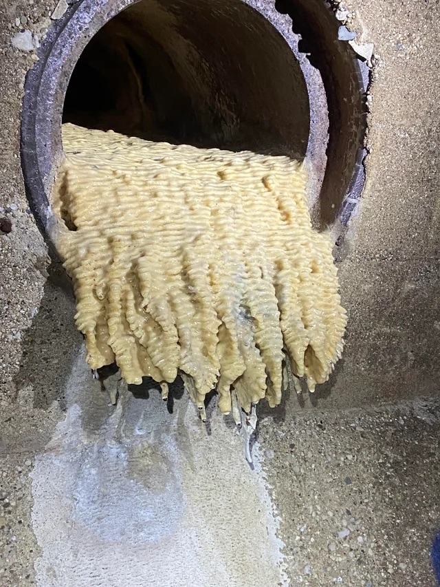 calcium and lime build-up from a tunnel in the shape of ramen noodles