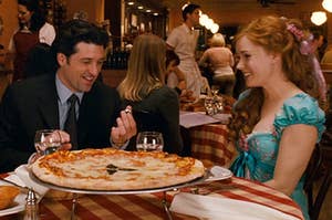 On the left, Patrick Dempsey and Amy Adams sitting down to eat pizza as Robert and Giselle in Enchanted