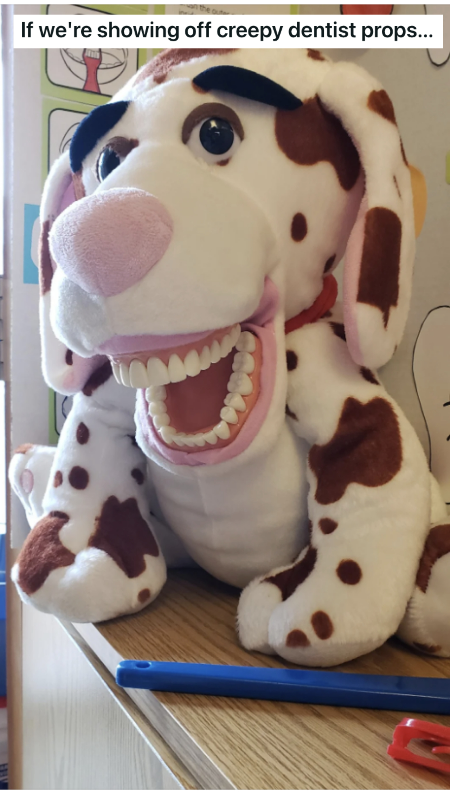 a stuffed animal with human teeth