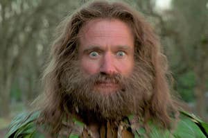 Robin Williams with wild hair and wide eyes in Jumanji.