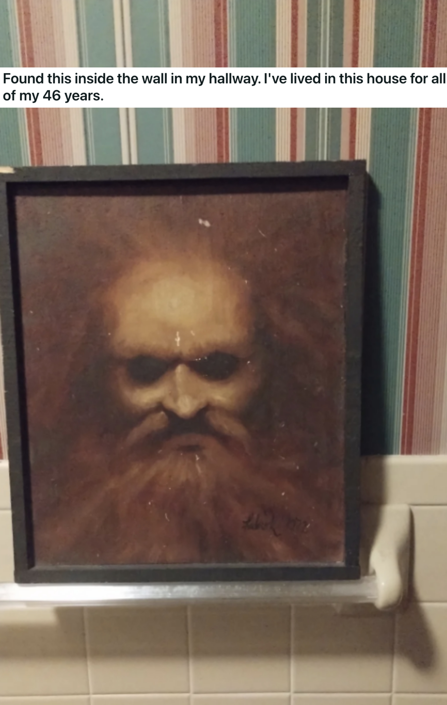 A painting of a scary man&#x27;s face