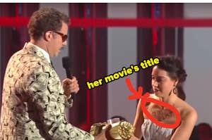 with her movie's title written on her chest, Aubrey Plaza tries to take Will Ferrell's award