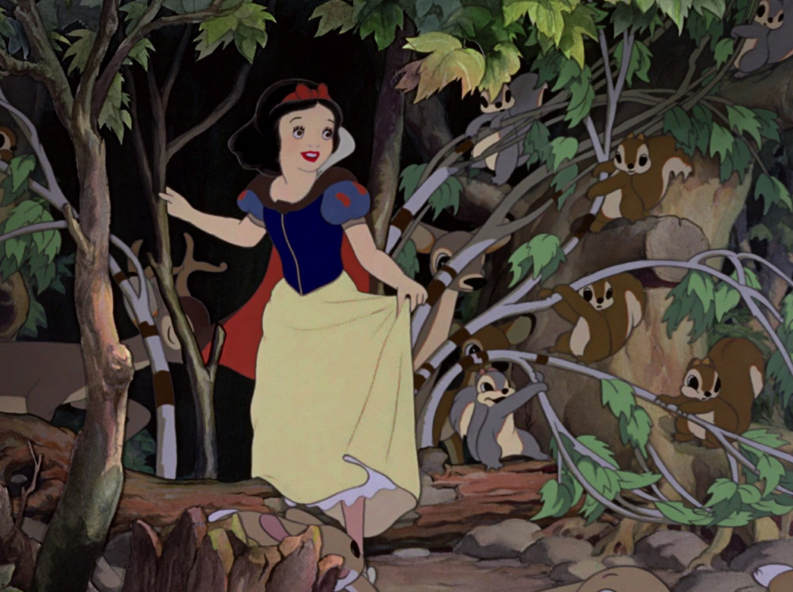 Snow White cowering against a rock.