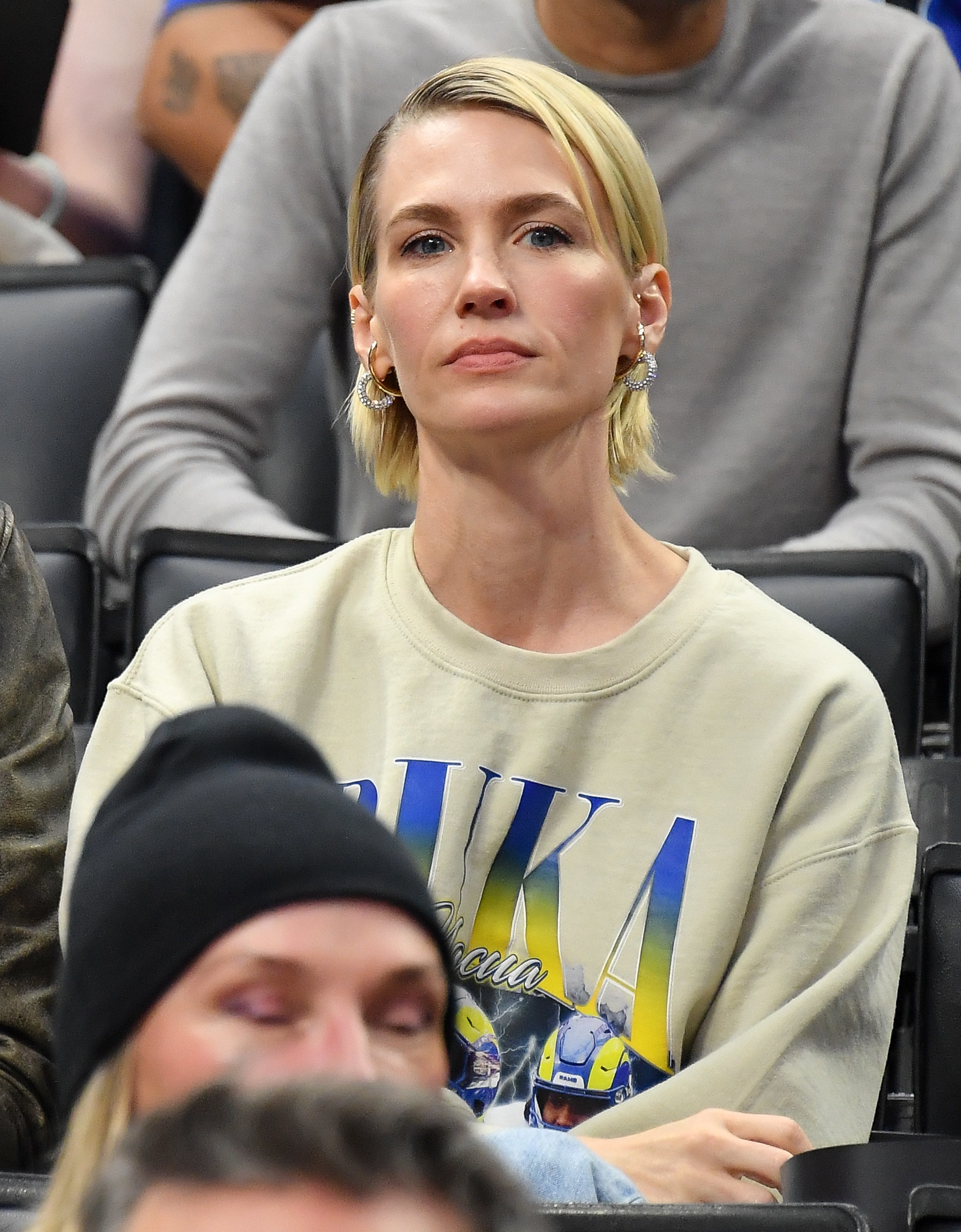 January wearing a sweatshirt in an audience