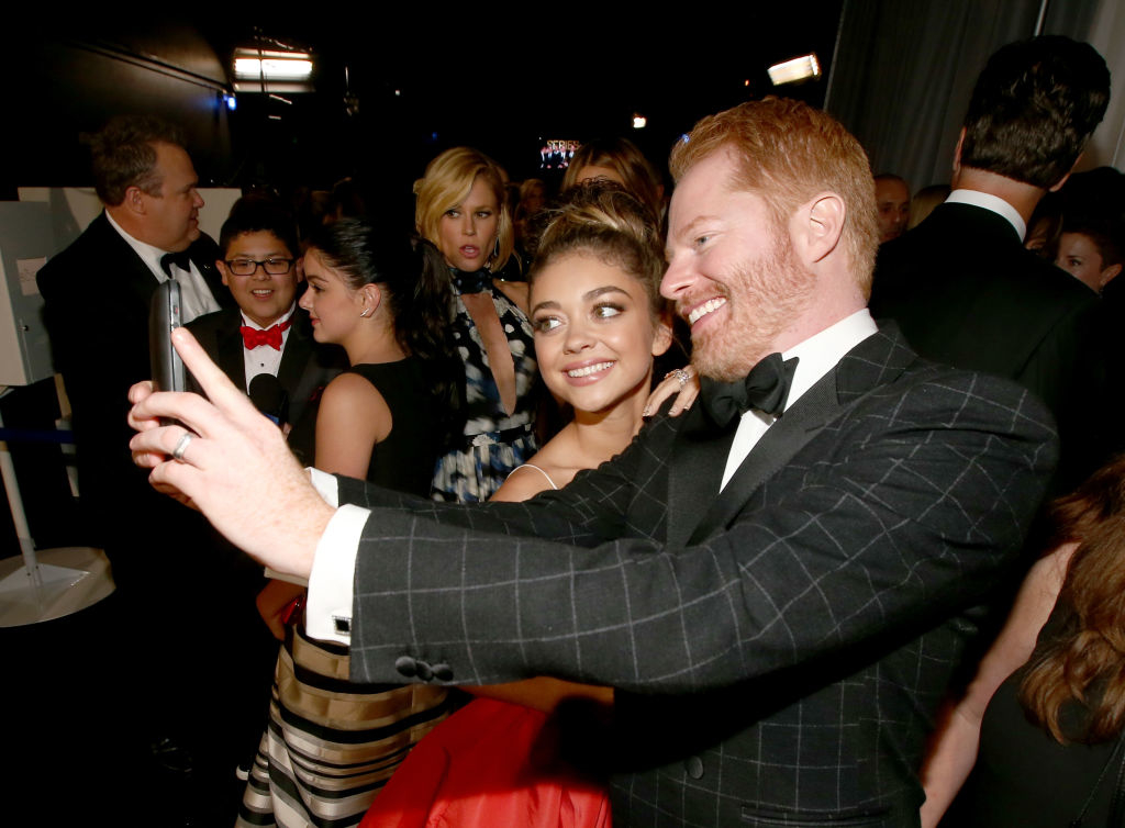 Sarah Hyland and Jesse Tyler Ferguson taking a selfie