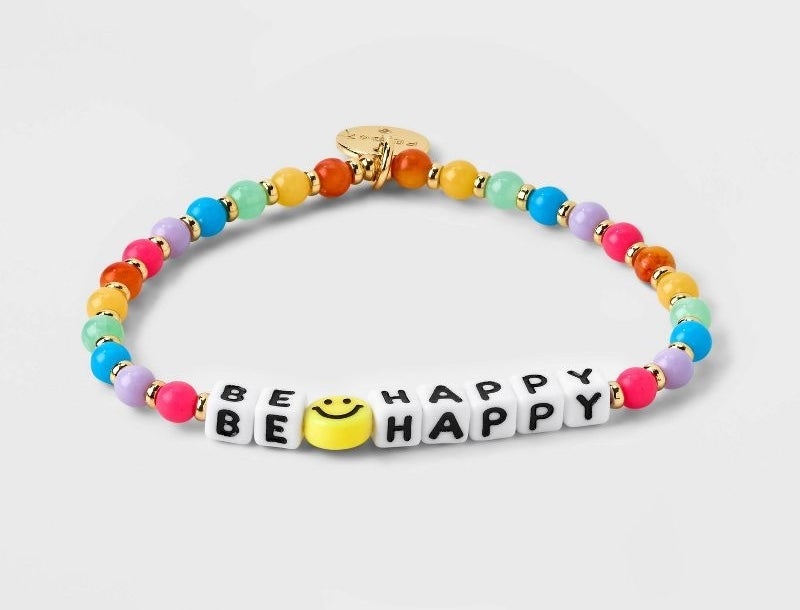 The colorful beaded bracelet with beads that say &quot;be happy&quot;