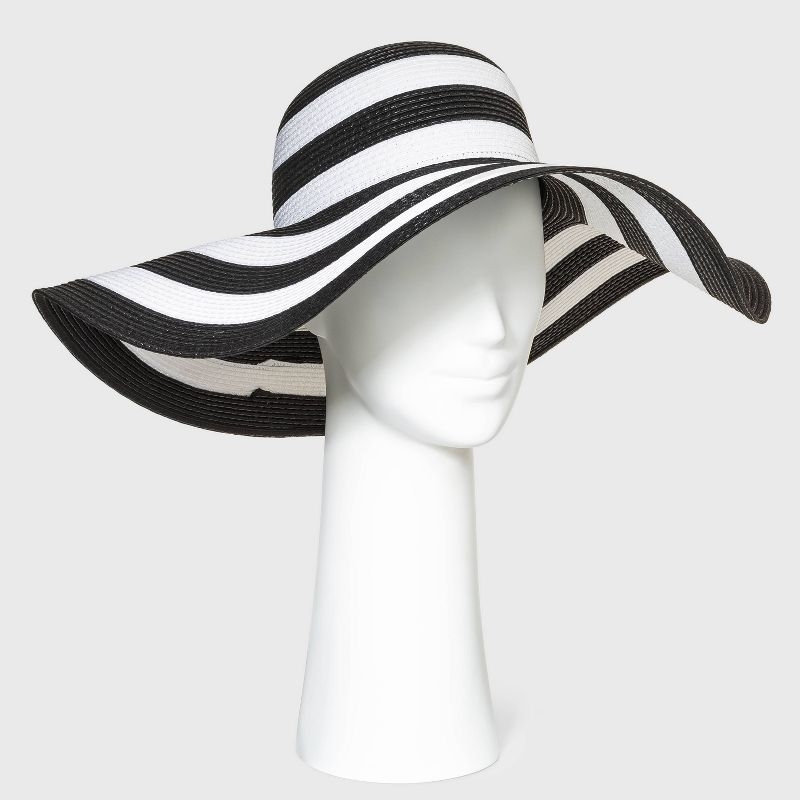 The black and white floppy straw hat