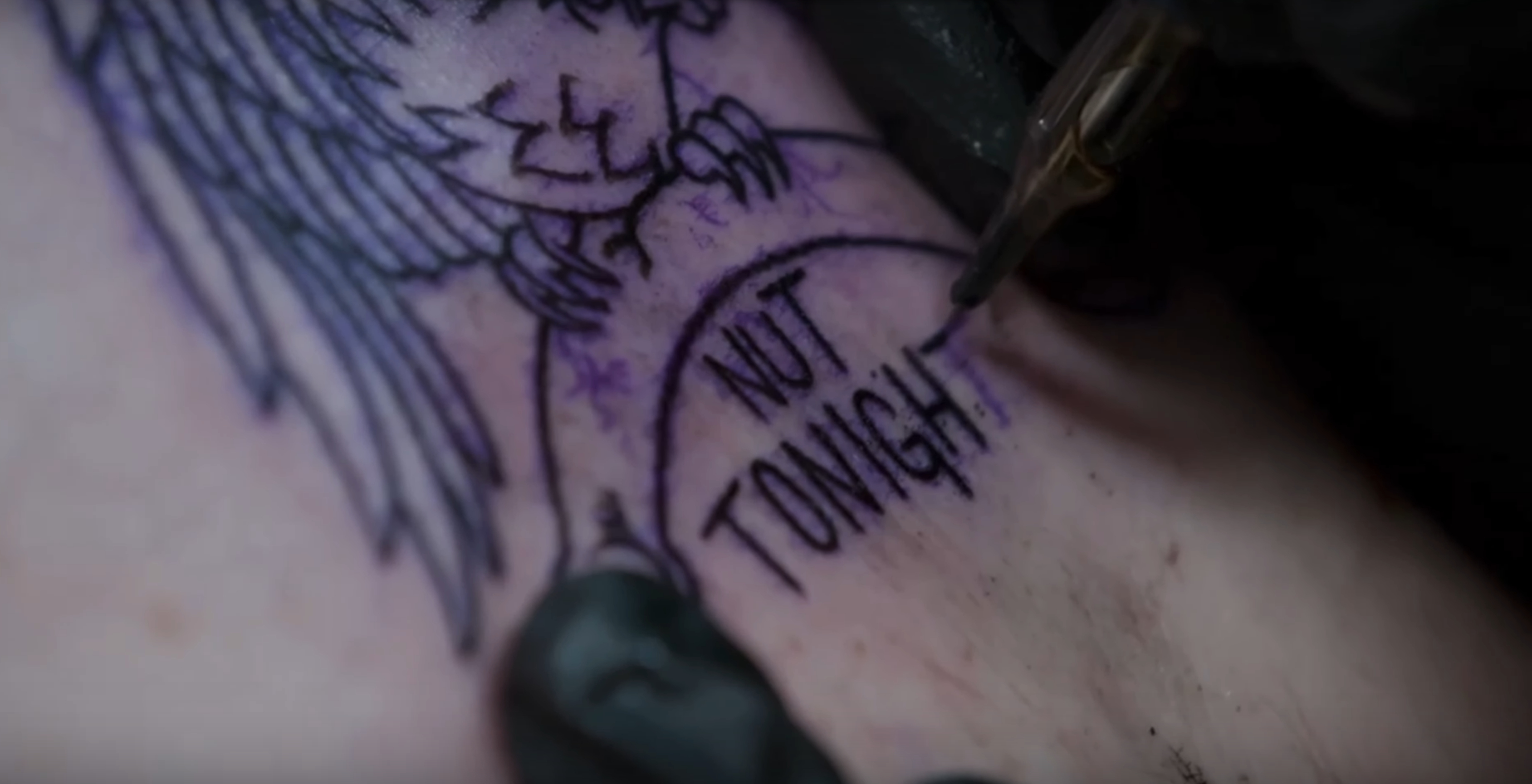 Anna Phylactic getting a tattoo that reads &quot;NUT TONIGHT.&quot;