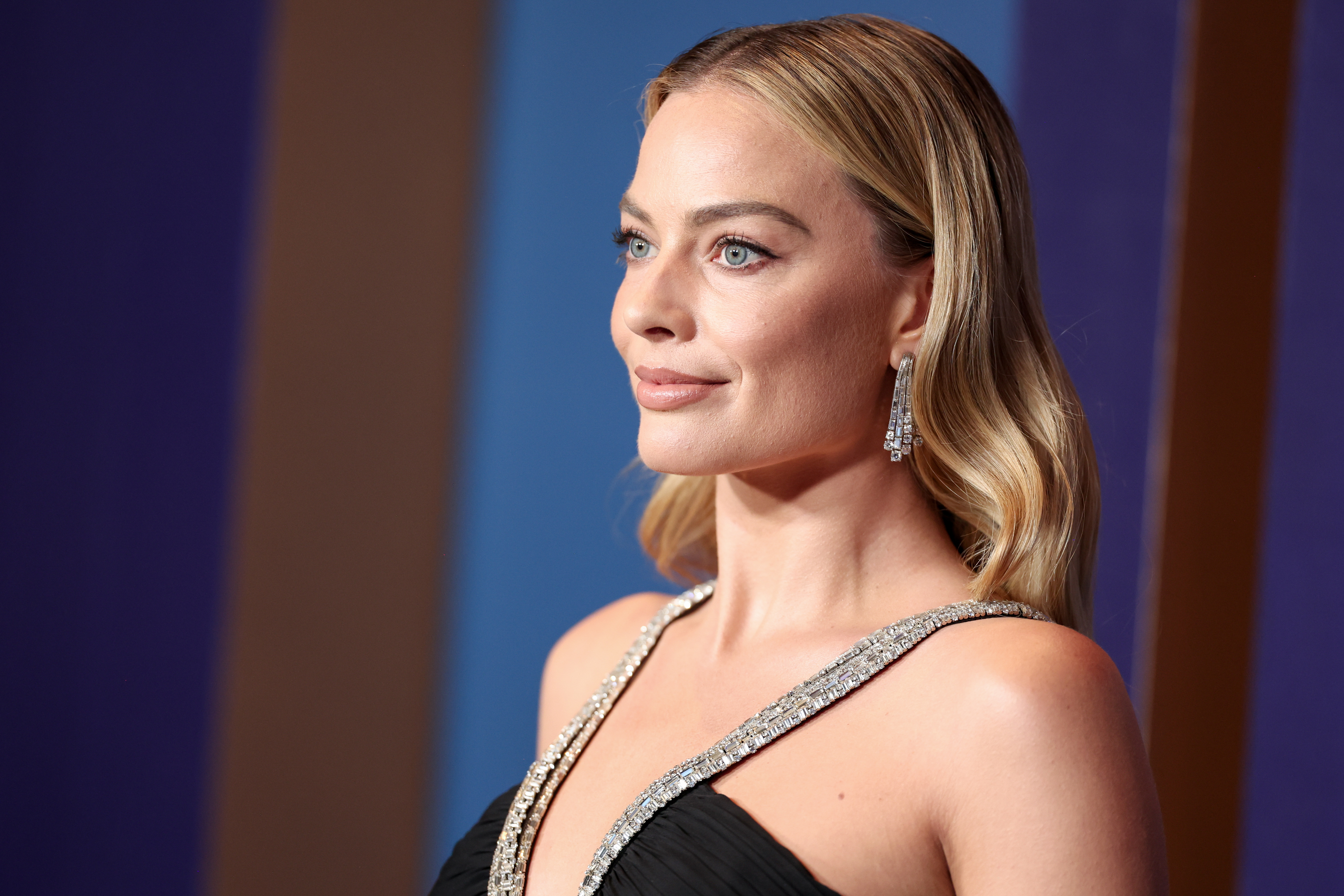 Close-up of Margot at a media event