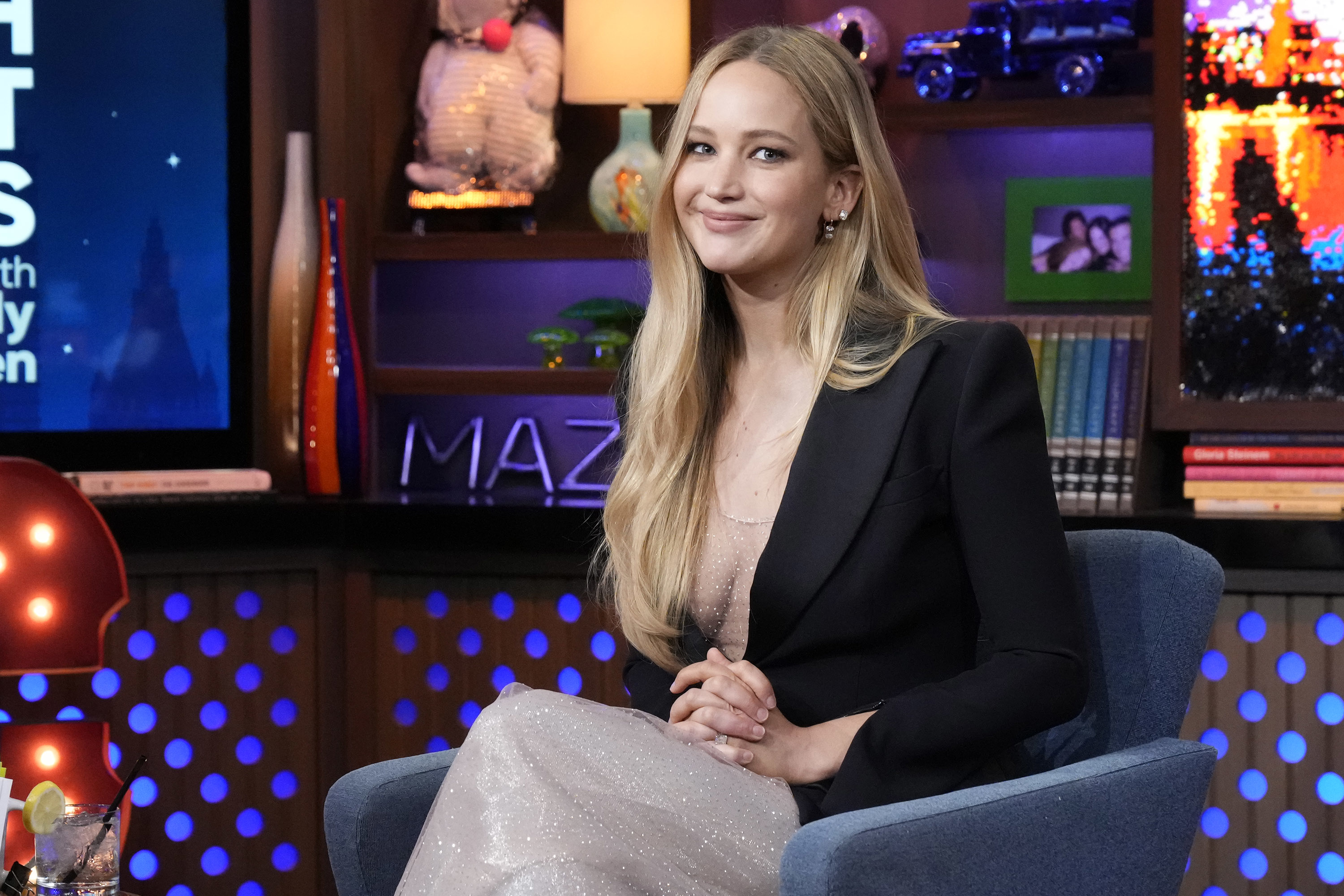 Close-up of Jlaw smiling and seated at the WWHL studios