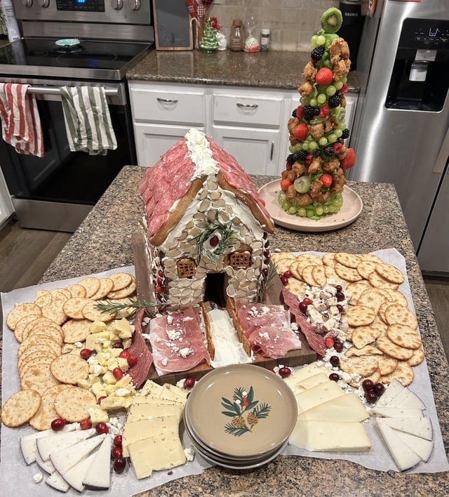 a charcuterie with a house built at the center