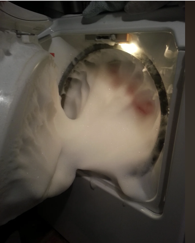 a washing machine full of foam