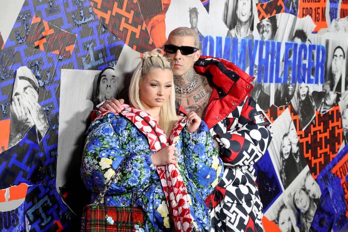 Alabama and Travis at a media event dressed in colorful prints