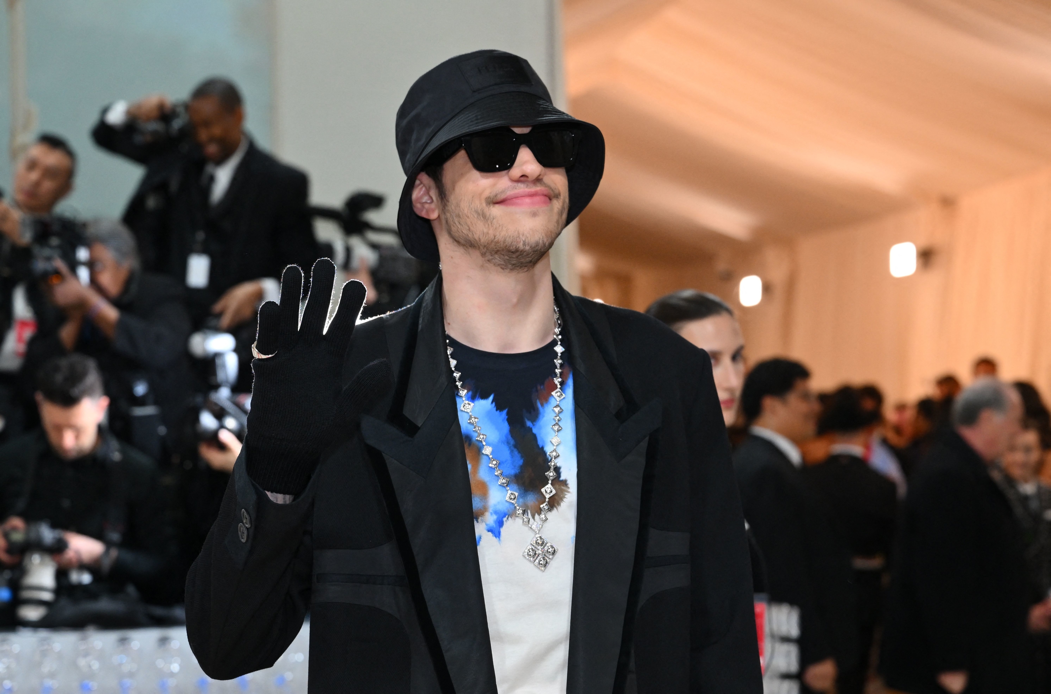 closeup of pete in a bucket hat and sunglasses for an event