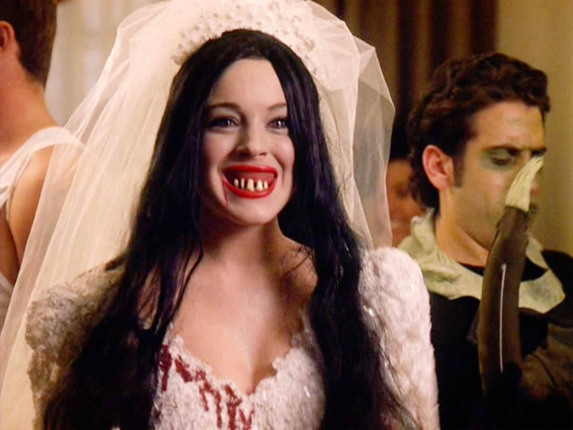 she&#x27;s got fake teeth in and fake blood on the dress