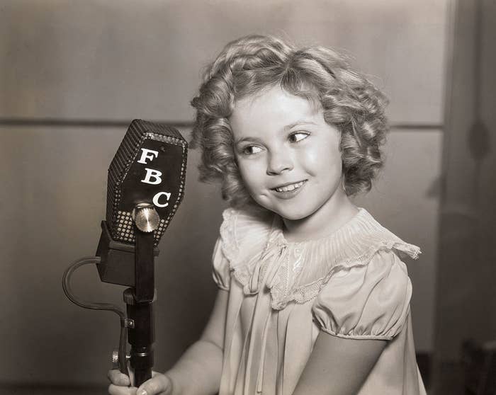 shirley holding an old mic