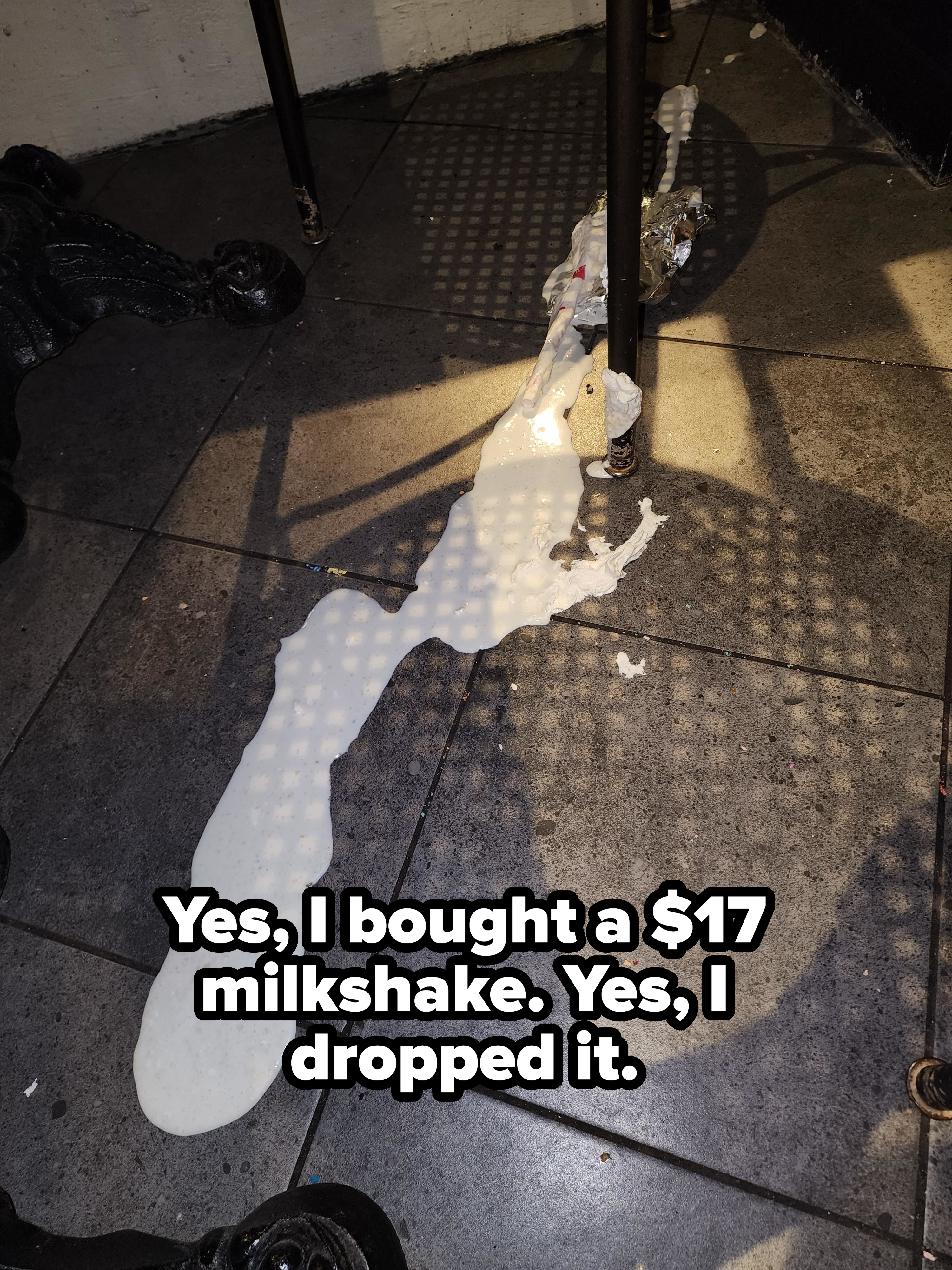 &quot;Yes, I bought a $17 milkshake; yes, I dropped it,&quot; showing spilled white liquid all over the floor