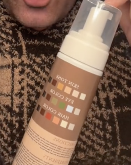 closeup of his tan bottle