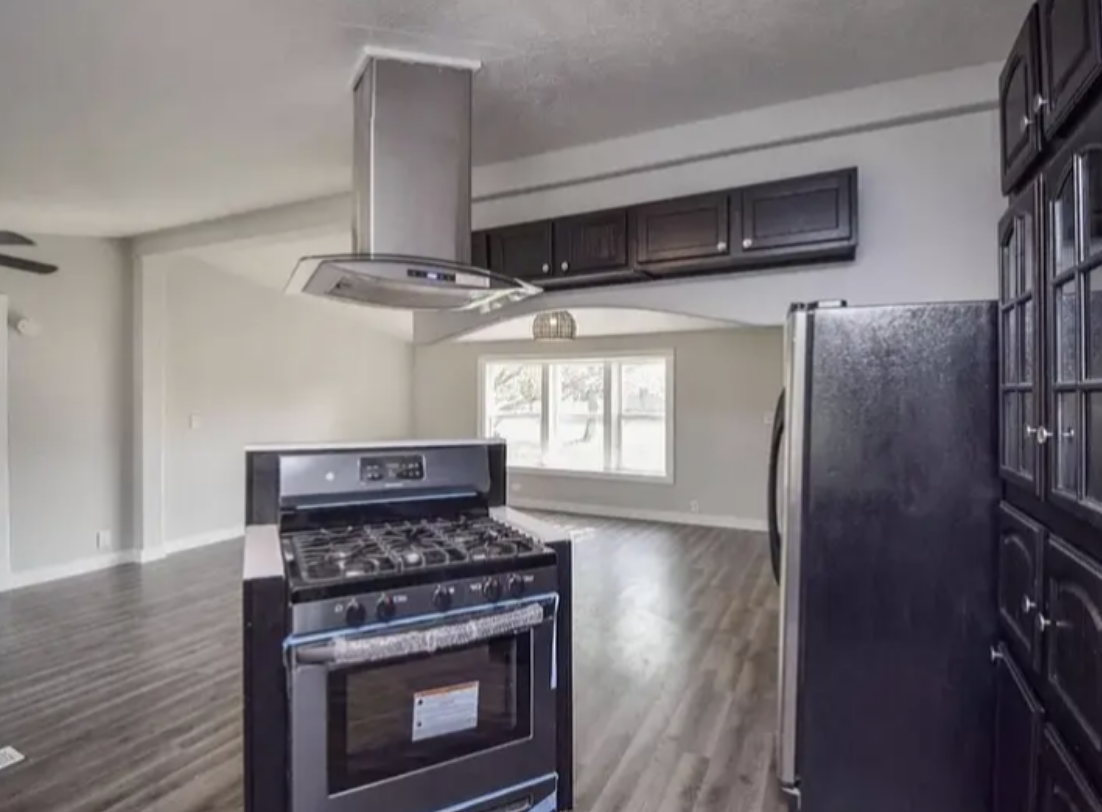 stove is in the middle with no counter space or anything