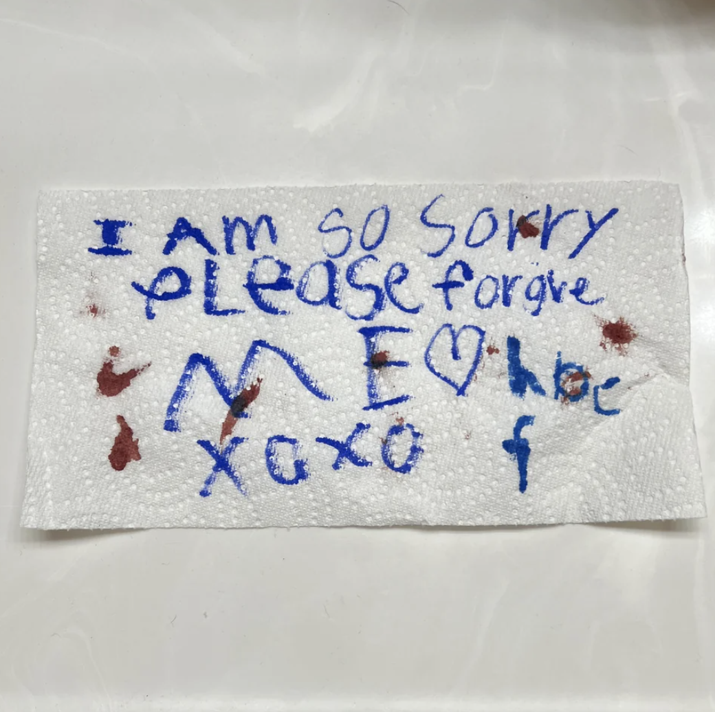 written on a napkin the note says, i am so sorry please forgive me
